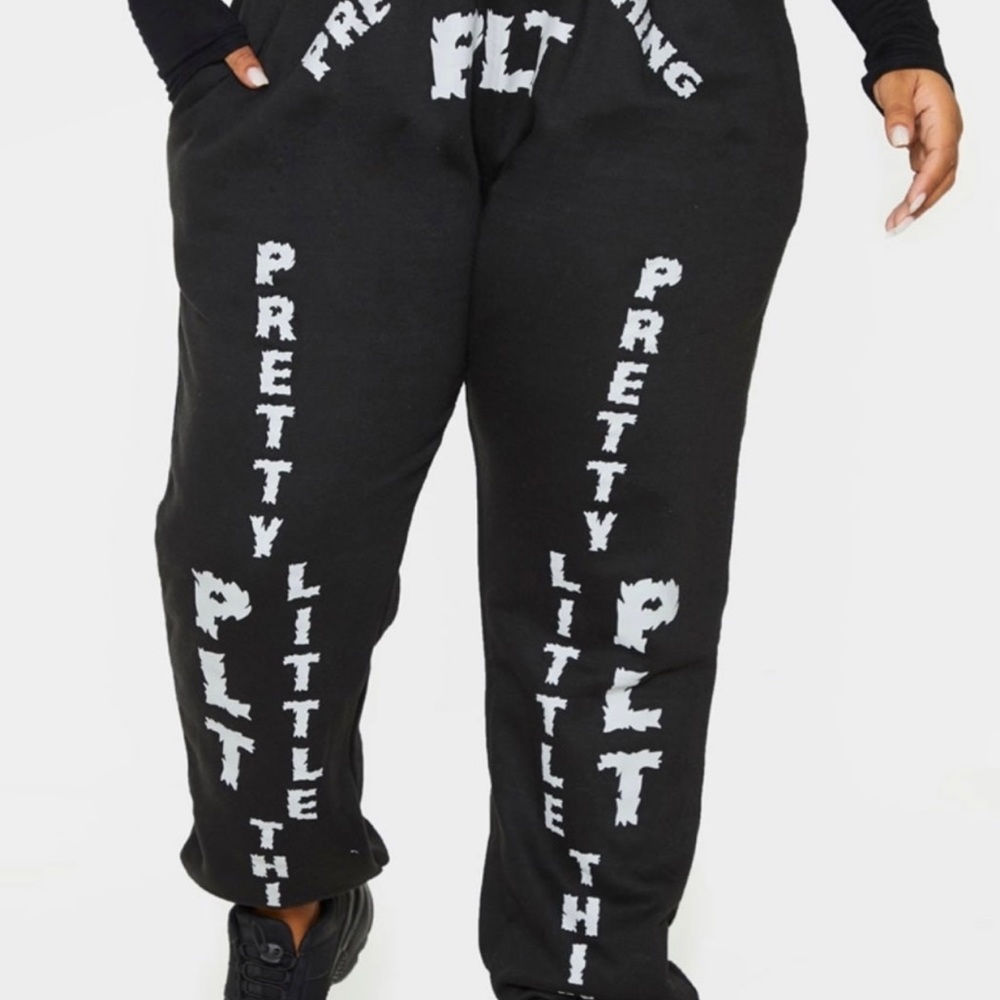 Black contrasting graphic print sweatpants
